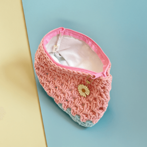 handmade crochet zipper pouch in light pink and blue