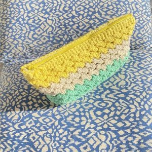 handmade zipper pouch in yellow, beige and turquoise