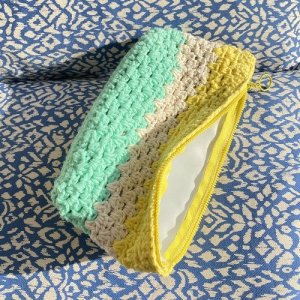 handmade zipper pouch in yellow, beige and turquoise
